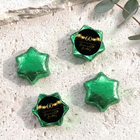 60th birthday star chocolates with green foil-covered stars and black-and-gold 60 label