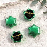 80th birthday foil-covered chocolate stars, green finish with black “80” label