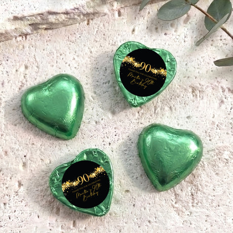 Green foil heart chocolates with black 90 birthday label and gold star text