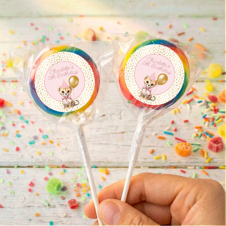 Blue and orange round lollipop with clear wrapper, dog birthday label and gold balloon