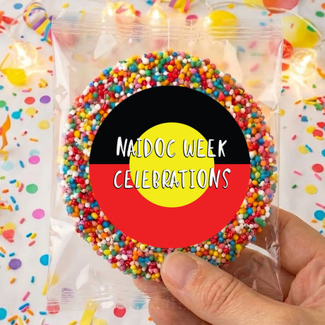 Personalised giant freckles in clear bag with round NAIDOC WEEK celebratory label