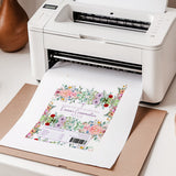 Chocolate bar wrapper print sheet with floral design coming out of a printer