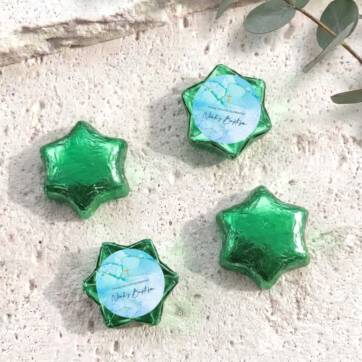 Personalised foil chocolate stars in green with baptism label and gold cross