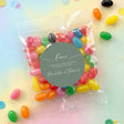 Personalised jelly bean bag with round sage green label reading Love and Thank you message