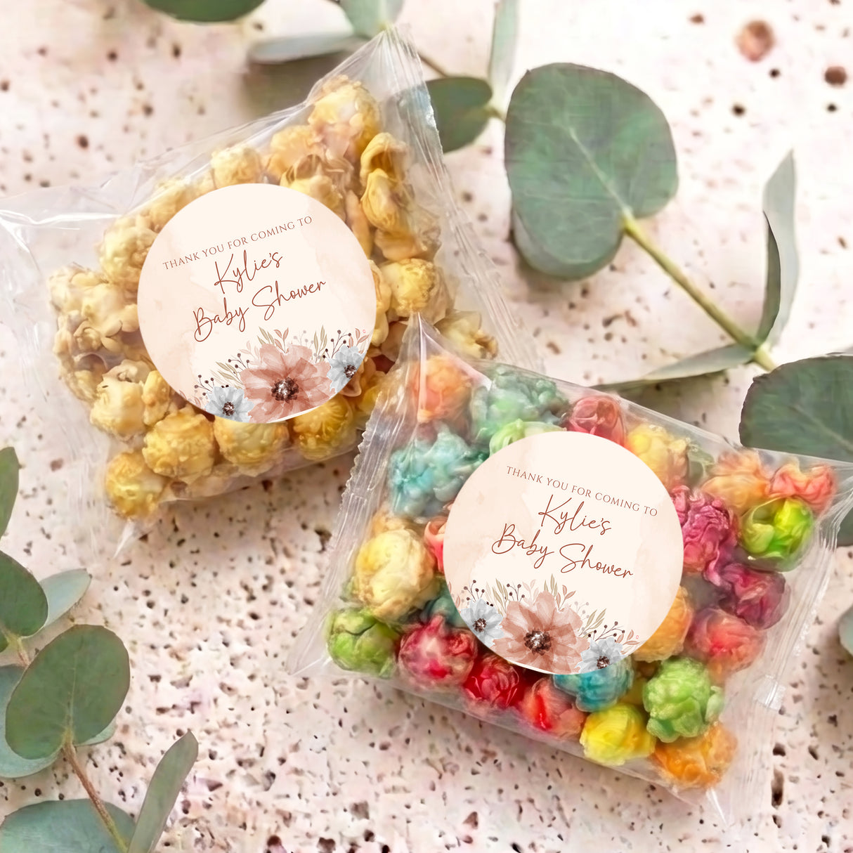 Personalized popcorn bag with floral circle tag and multicolor popcorn in clear wrap