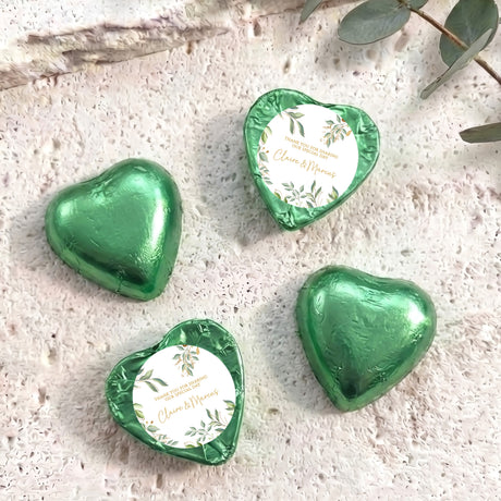 Personalised foil-covered chocolate hearts, green with printed gift message circle