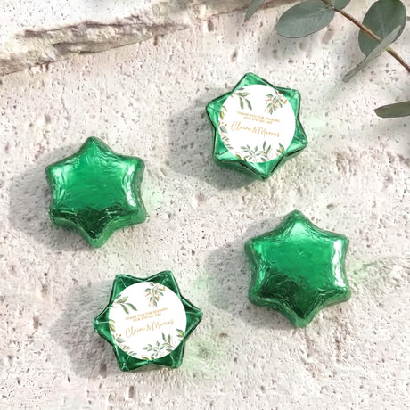 Personalised foil-covered chocolate star candies, emerald green with eucalyptus label