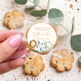Chocolate chip cookies with round christening label and watercolor baby animals detail