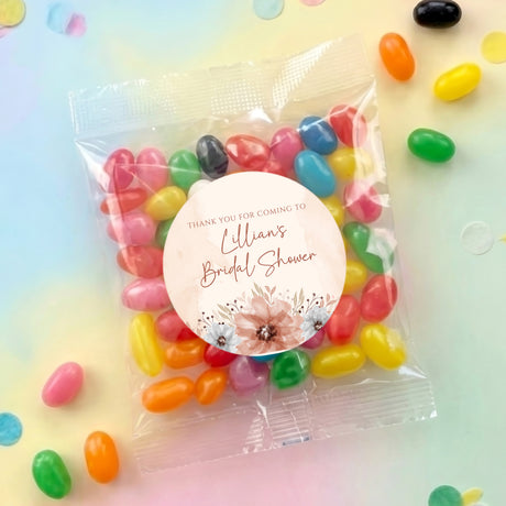 Personalised jelly bean bag with clear wrapper, round bridal shower label, assorted candies inside.