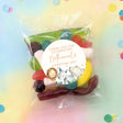 Personalised christening party mix lolly bag with round label and baby animal watercolor design