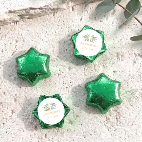 Personalised foil-covered chocolate stars, green with cross label on white circle