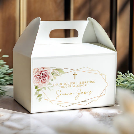 White gable favour box with rose-gold frame, floral accents, and personalised christening text