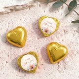 Gold heart-shaped foil chocolate with “Happy Mother’s Day” floral message on white center