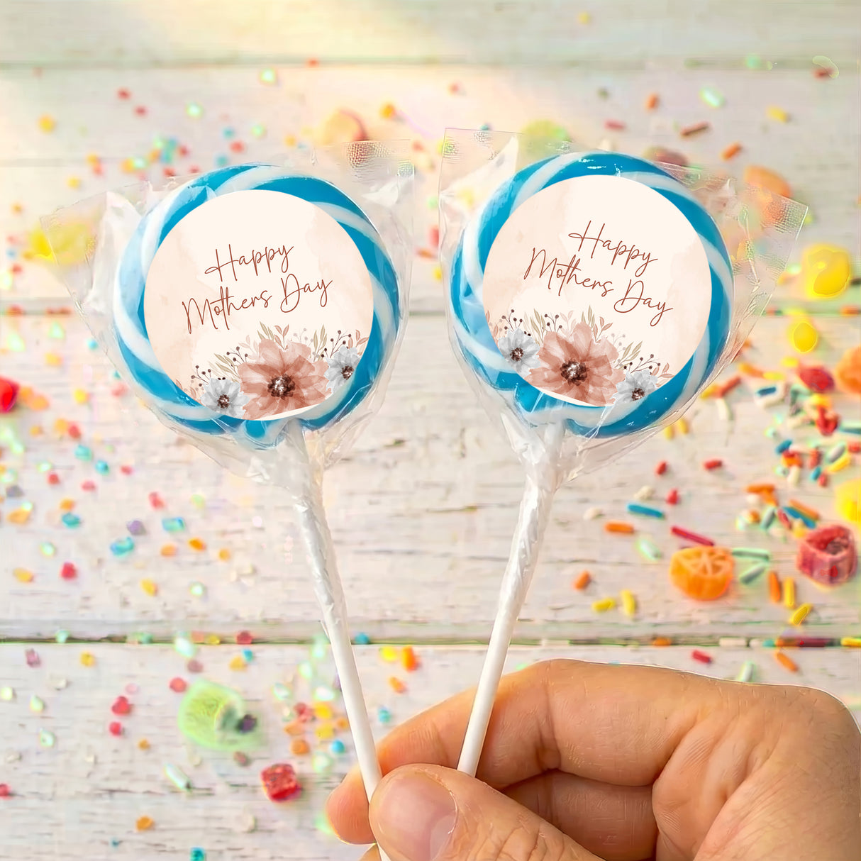 Mother's Day lollipops: blue swirl wrappers with floral "Happy Mother's Day"