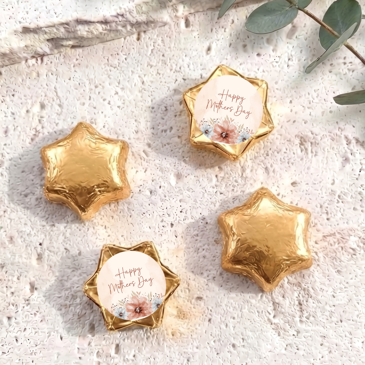 Gold foil-covered chocolate stars with a “Happy Mother’s Day” label card