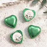 Green foil chocolate hearts with round personalised label reading “Two Wild”