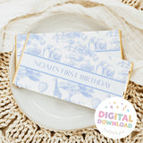Blue safari chocolate bar gift wrapper with elephants and text Noah's First Birthday