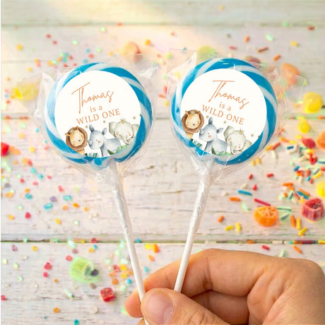 Personalised lollipops with blue-rim round baby animal labels, Thomas "Wild One".