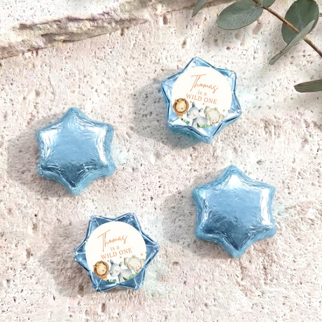 Personalised “Wild One” foil-covered chocolate stars, blue star shapes with Thomas label