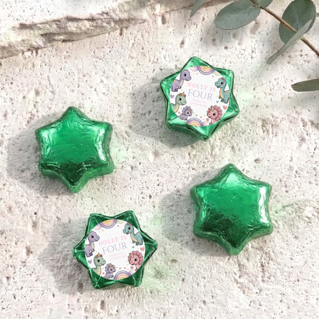 Green foil star balloons plus green dinosaur “Dolly is Four” foil balloon