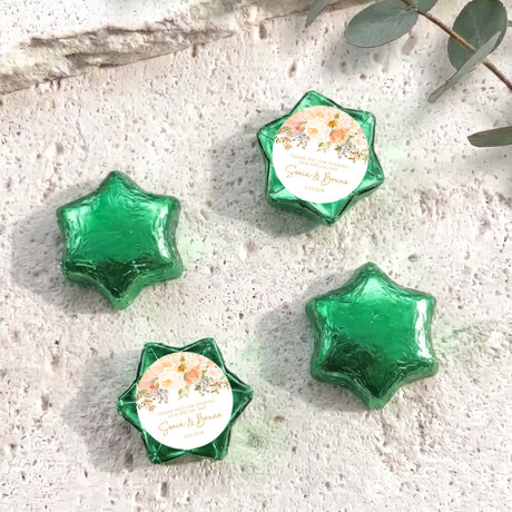 Green personalised foil-covered chocolate star with floral message card