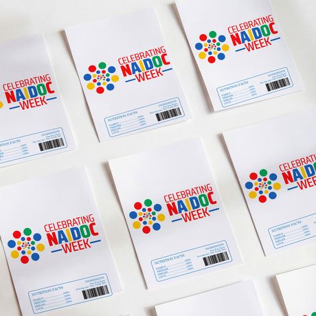 Set of NAIDOC Week printed chocolate wrappers, white with colorful dot logo and labels