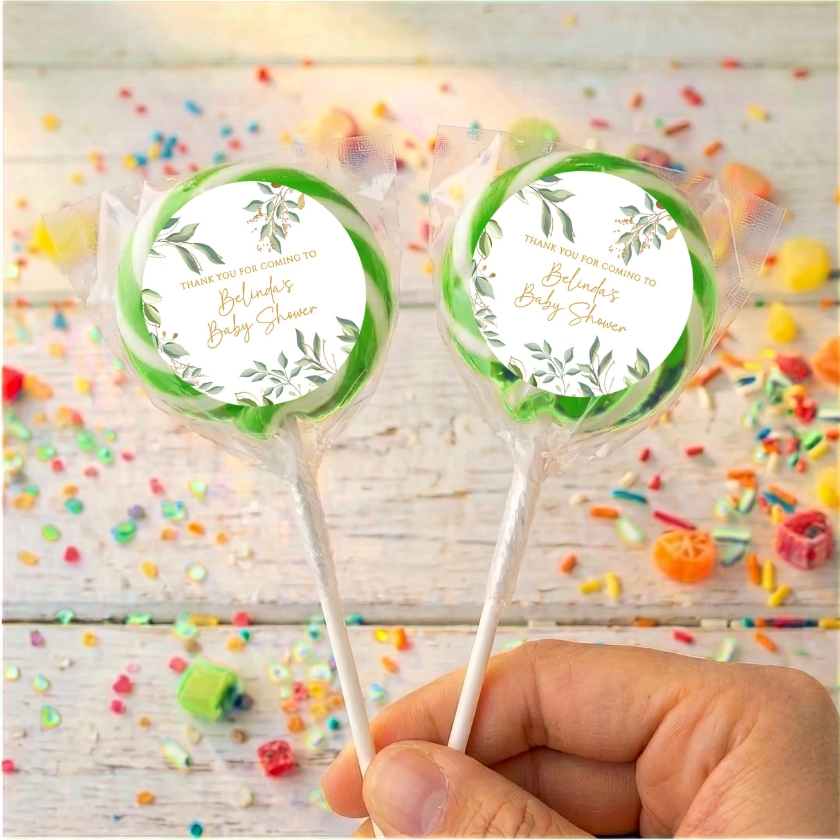 Personalised baby shower lollipops with eucalyptus wreath labels, green bands