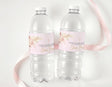 Two clear water bottles with pink boho pampas confirmation labels and thank-you message