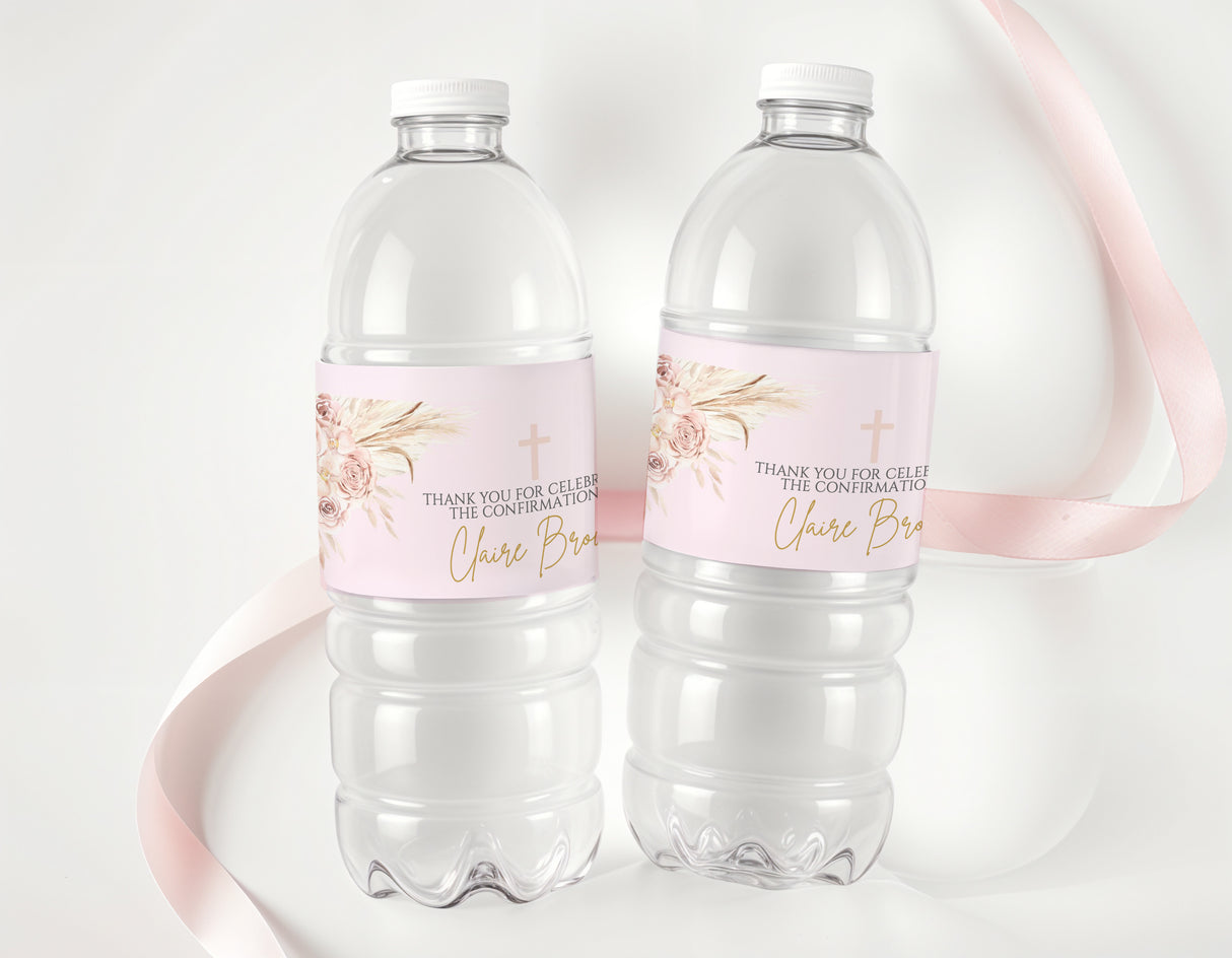 Two clear water bottles with pink boho pampas confirmation labels and thank-you message
