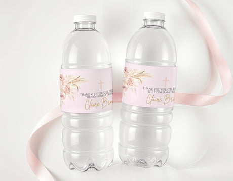 Clear plastic water bottles with pink confirmation label and cross, boho pampas design
