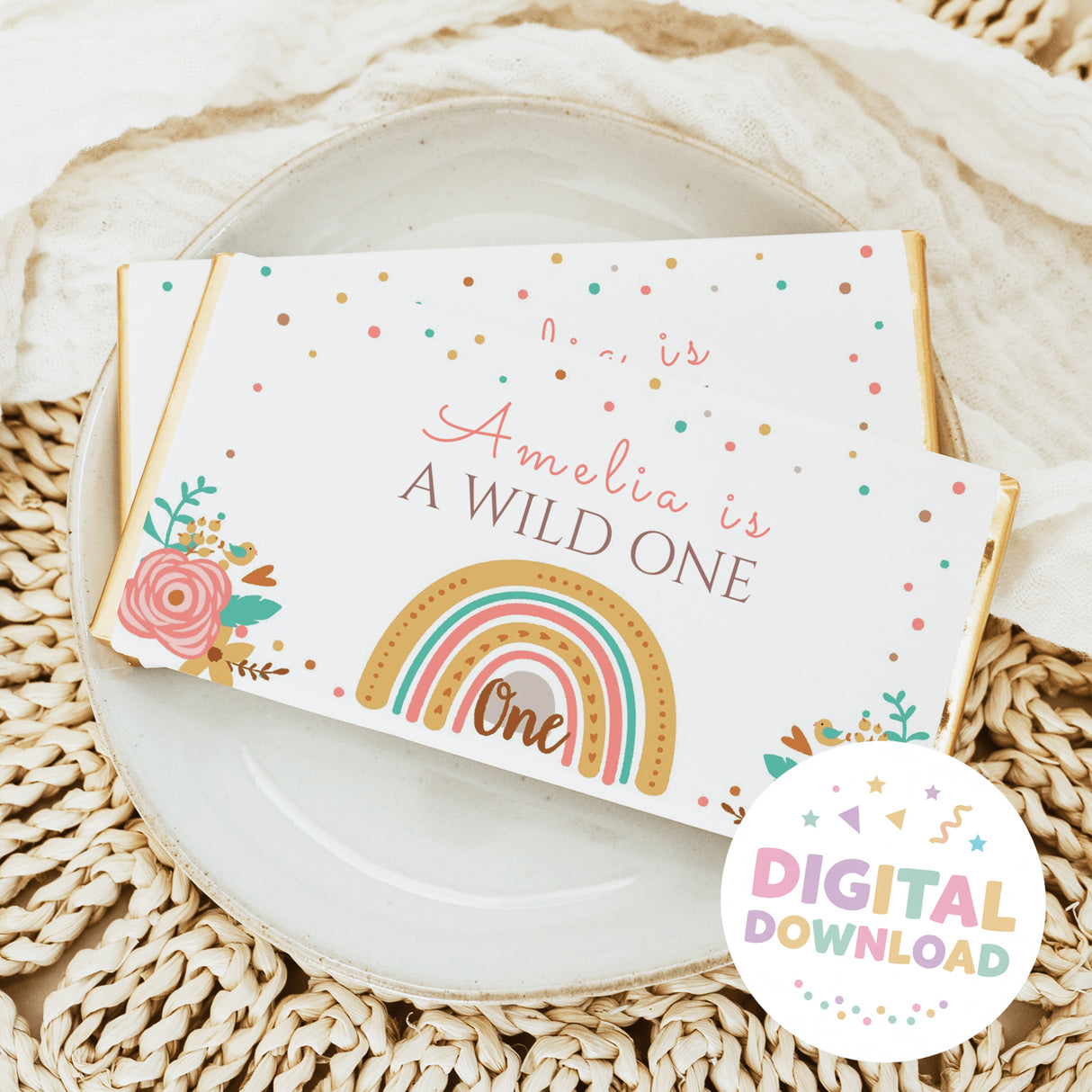 Chocolate bar wrapper with rainbow and floral design, text 'A WILD ONE' and 'One'.