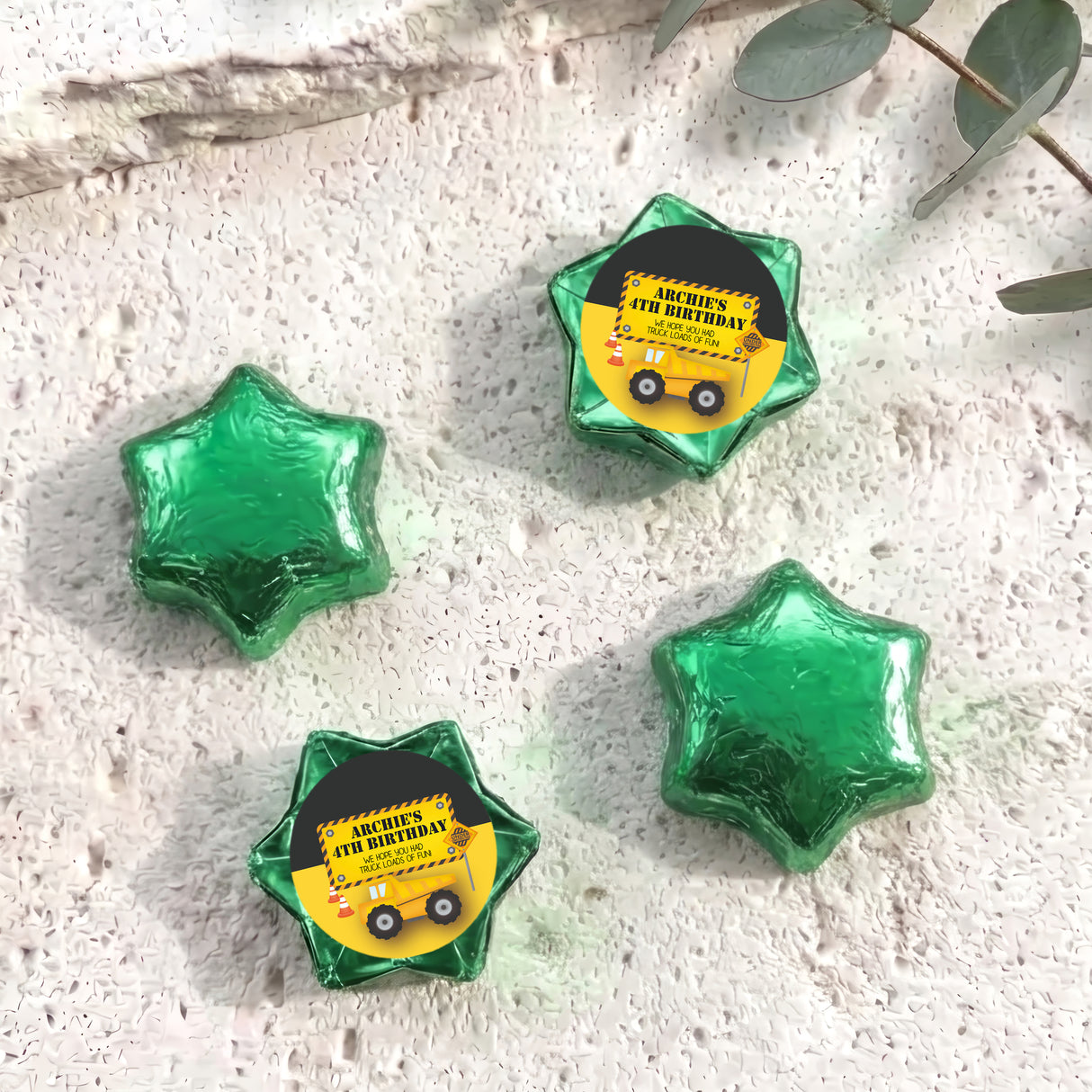 Personalised foil chocolate star with “Archie’s 4th Birthday” label, green foil