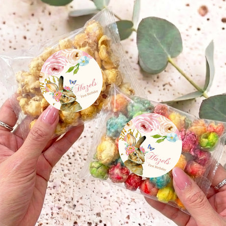Personalised popcorn bag with floral bunny tag and pastel crunchy popcorn inside