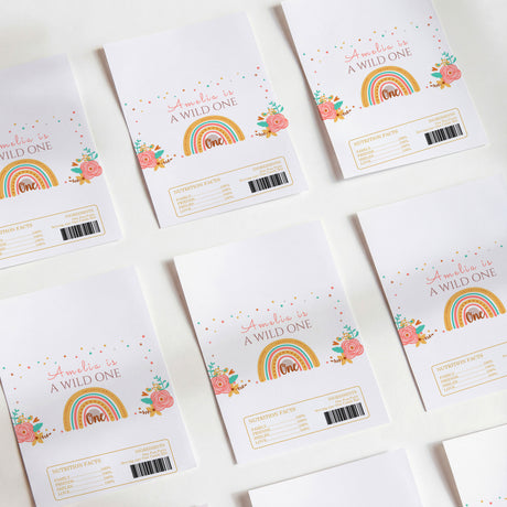 First birthday chocolate wrappers with rainbow 'A Wild One' and floral accents
