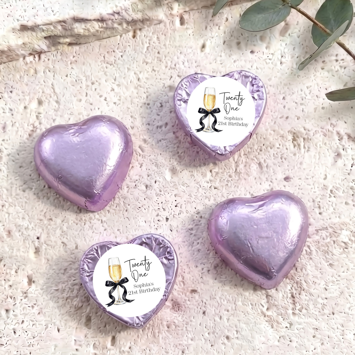 Lavender foil-covered chocolate hearts with a personalized 21st birthday label