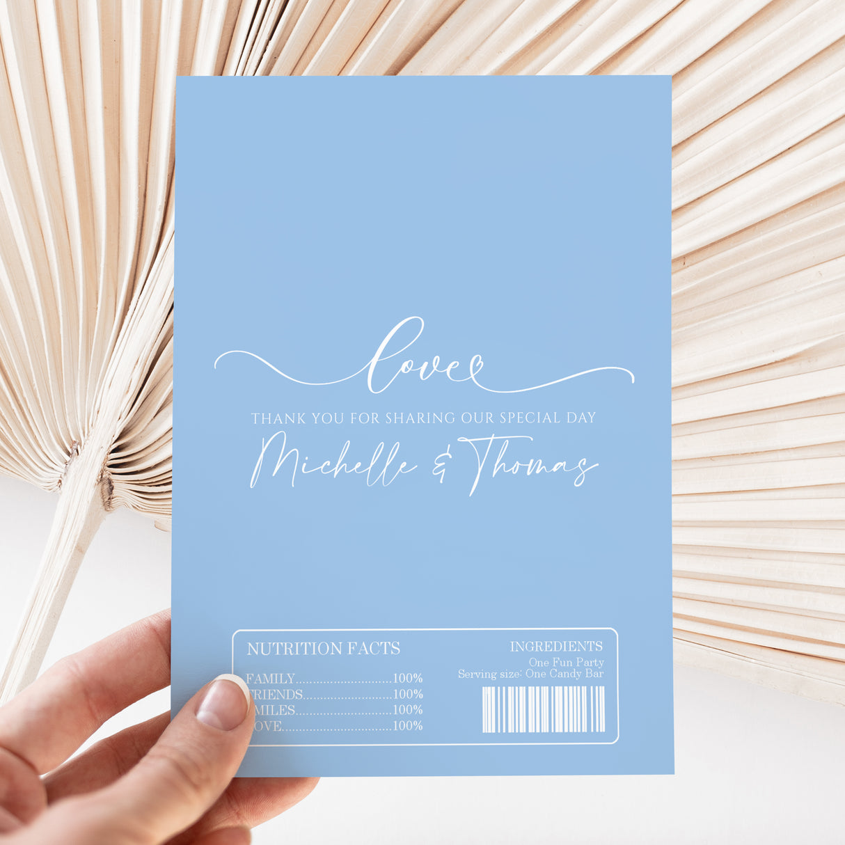 Baby blue wedding chocolate wrapper with “Love” text and names Michelle & Thomas