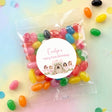 Personalised jelly bean party bag: clear wrap with colorful candies and round fairy label