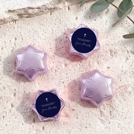 Lilac foil star chocolates with dark blue round label featuring cross and message