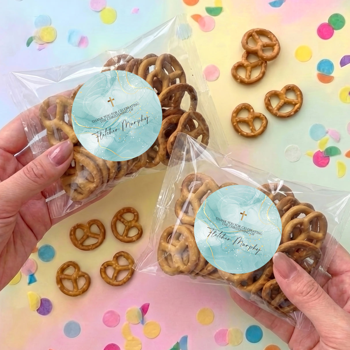 Personalised pretzel bag with bagged pretzels and round blue cross label