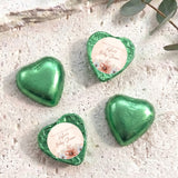 Personalised foil-covered heart chocolates, green, with printed baby shower label