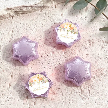 Foil-covered star chocolates with lavender purple foil and a white floral name label
