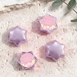 Lilac/purple foil chocolate stars with a pink hex label reading “May-Bee Shower”