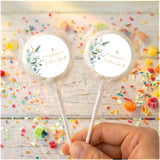 Personalised baptism lollipops: two clear-wrapped, white floral cross labels