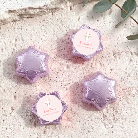 Lavender/purple foil-covered chocolate stars with personalised cross label