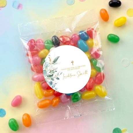 Personalised jelly bean bag with round baptism label and gold cross, assorted colorful candies