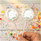 Personalised dinosaur birthday lollipops with white round labels and clear wrappers