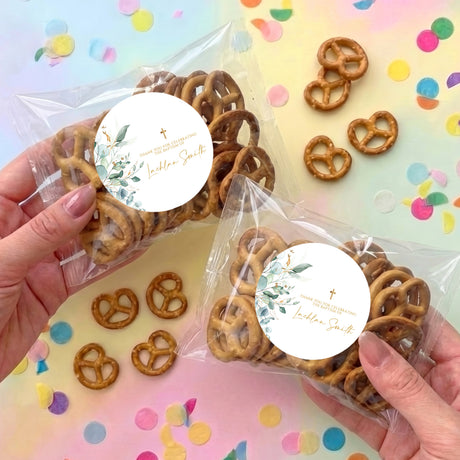 Personalised pretzel bag in clear wrap with brown pretzels and round green-leaf label