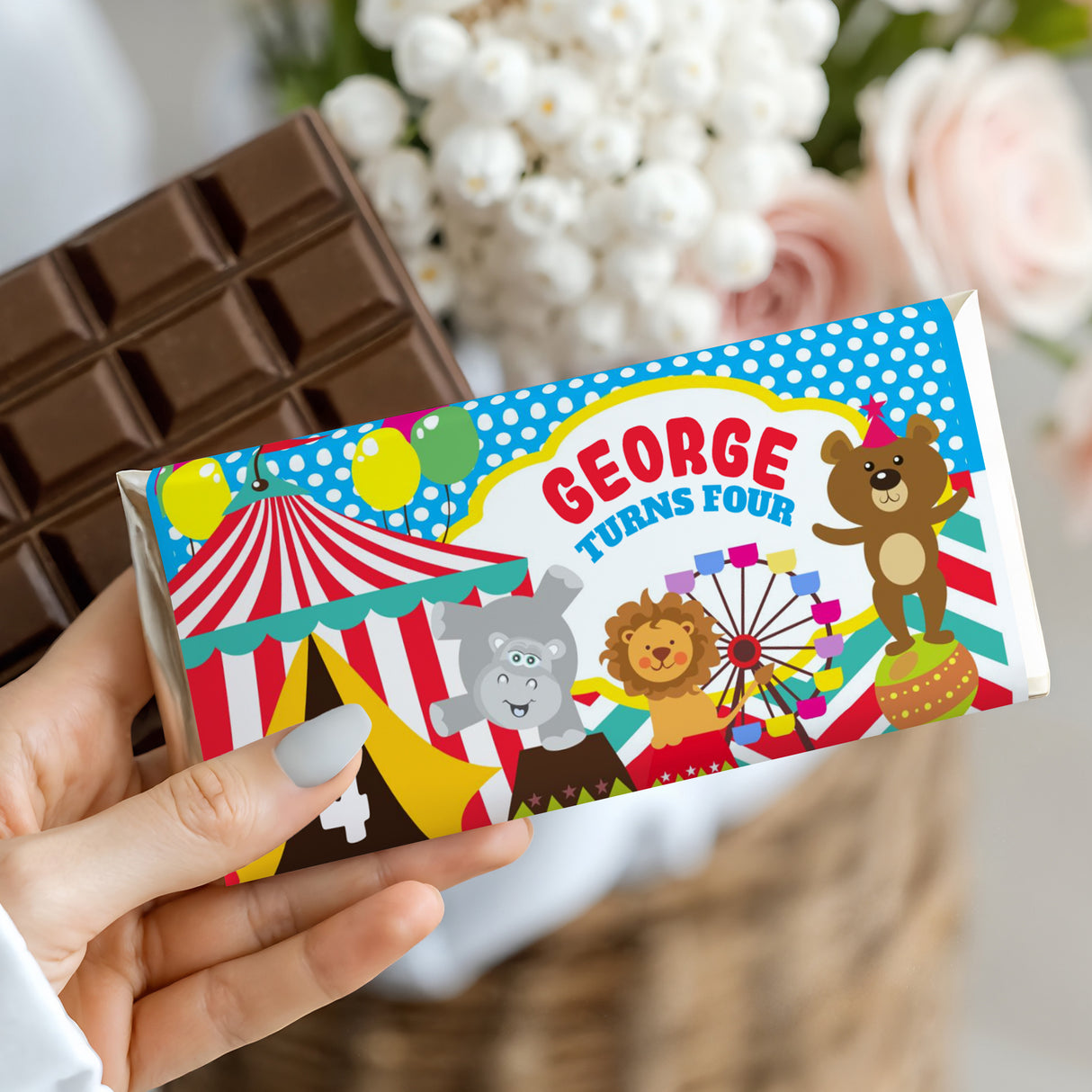 Birthday circus chocolate bar wrapper with George turns four text and bear mascot