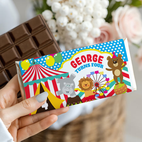 Birthday circus chocolate bar wrapper with George turns four text and bear mascot