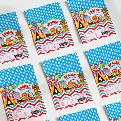 Circus-themed blue printed chocolate wrappers with George Zoo Tour text and barcode
